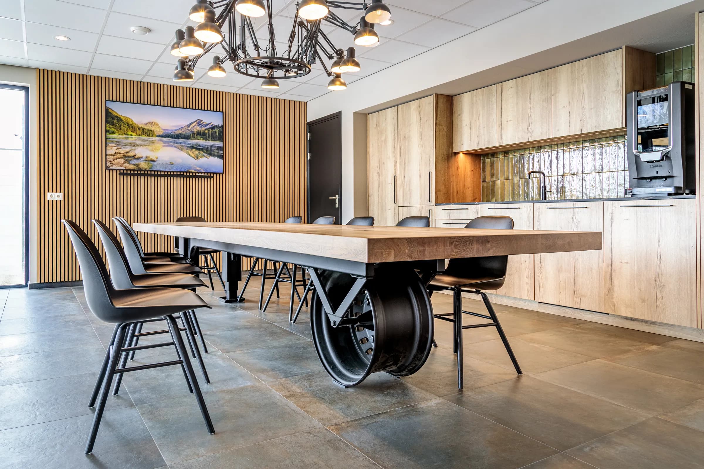 Canteen at Van Wieren in Emmeloord with the long table on a rim base and the kitchen